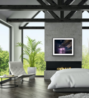 Coastal Storm framed above a fireplace in a modern interior