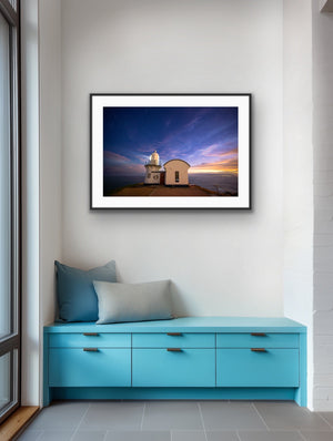 Last Light framed above a turquoise built-in bench in a contemporary interior