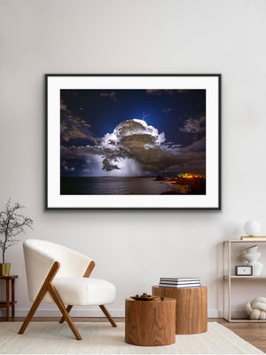 Storm over Nobby's framed in a bright contemporary living room