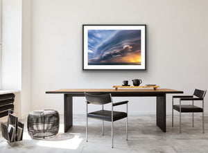 Sunset Storm framed in a light minimalist interior