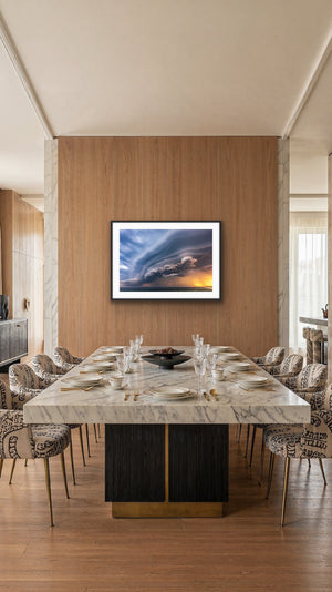 Sunset Storm framed in a timber dining room